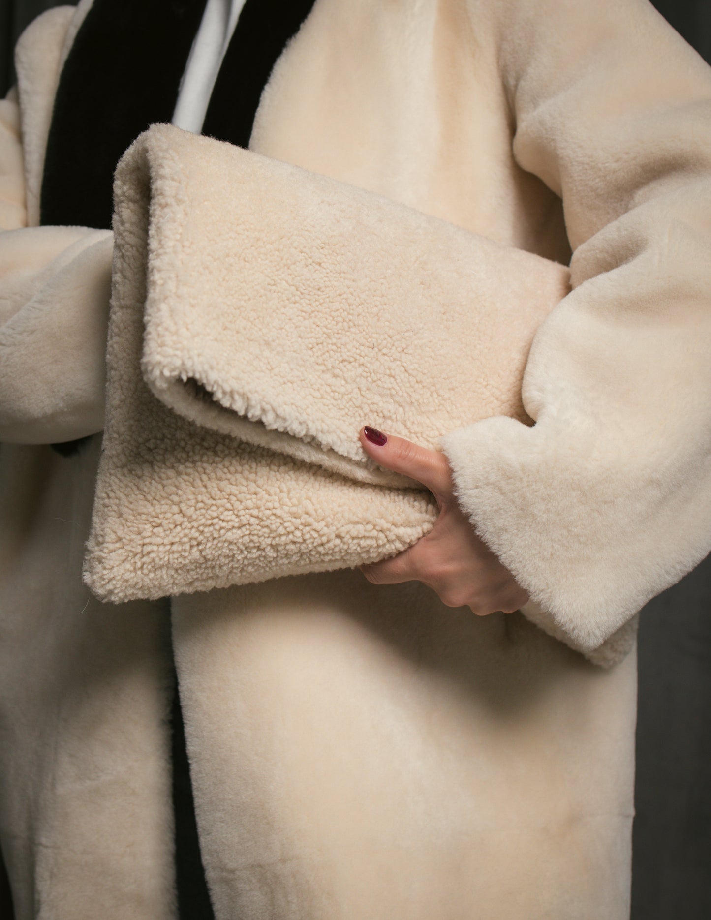 Shearling pillow clutch